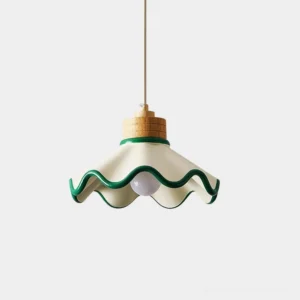Tilda scalloped pendant light with cream resin shade and green contrast trim, studio front view showing wavy edge design