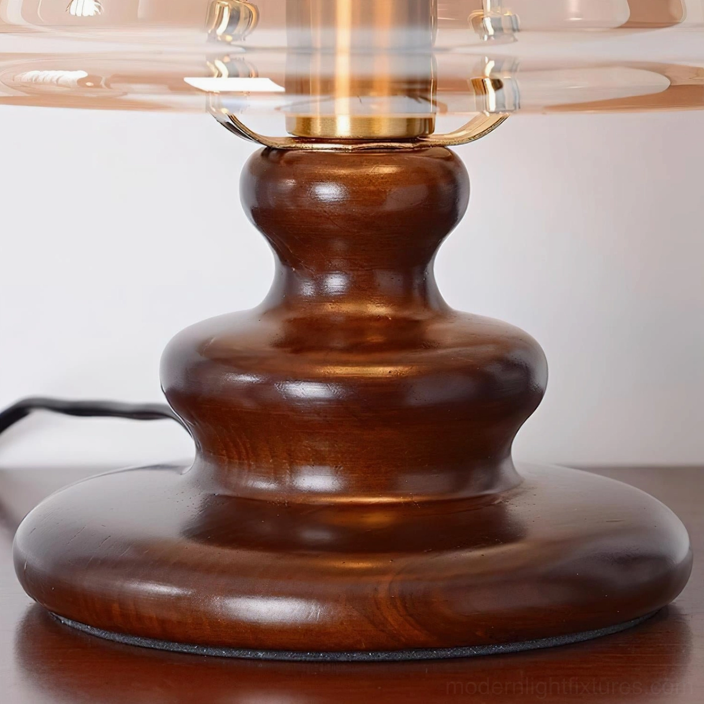 Tilda table lamp ambient lighting effect with warm cognac glow creating cozy interior atmosphere