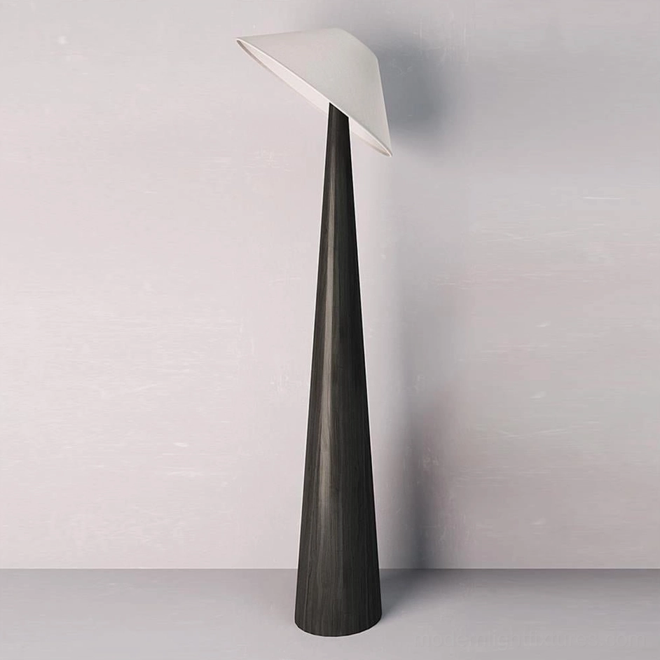 Black and white modern floor lamp with tapered pole and adjustable angled fabric shade