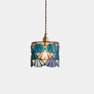 Tina blue stained glass pendant light with lead line detailing and brass canopy, front view studio shot