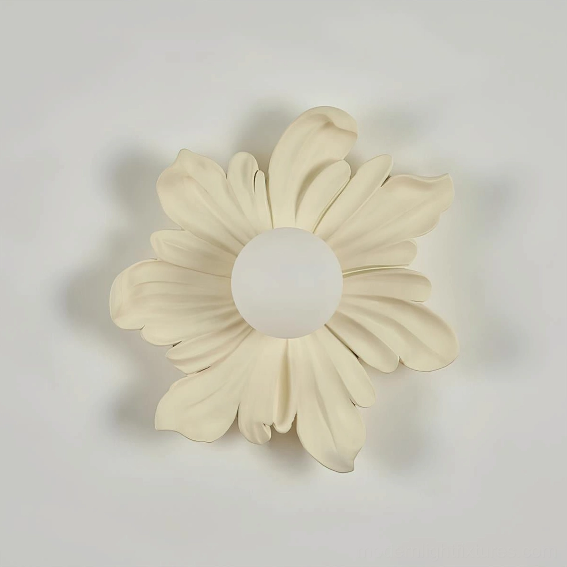 Tina flower wall sconce paired with gallery wall artwork, botanical sconce as decorative lighting accent