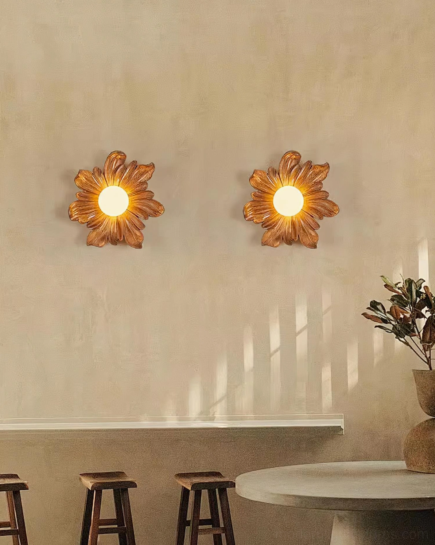 Tina flower wall sconce installation view, hardwired fixture mounted on residential interior wall