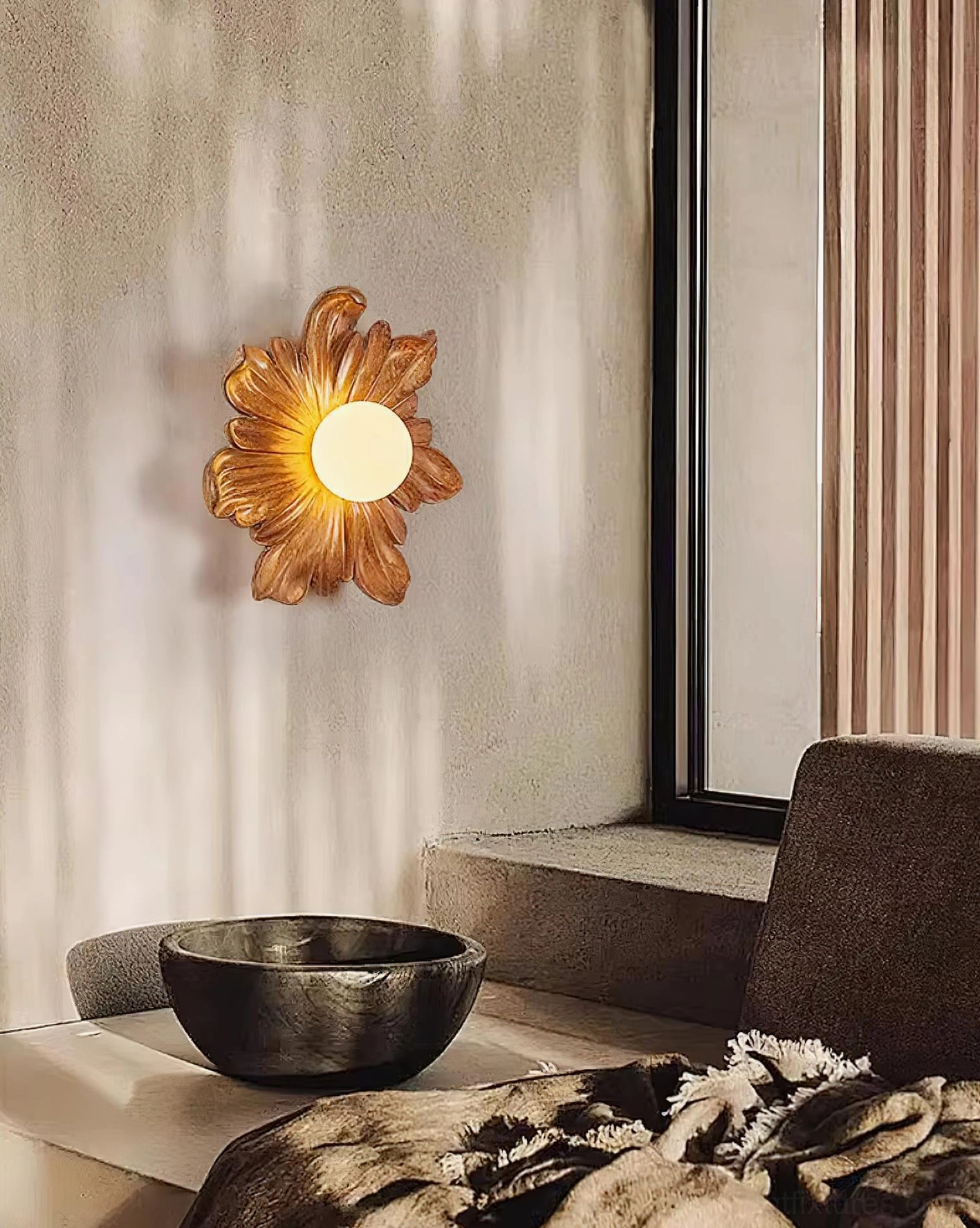 Tina floral wall sconce illuminated at night, warm ambient light from botanical fixture in modern bedroom