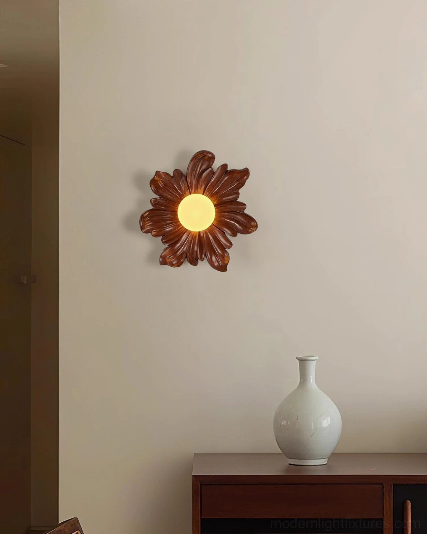 Tina flower wall sconce close-up detail, resin petal texture and molded botanical form craftsmanship