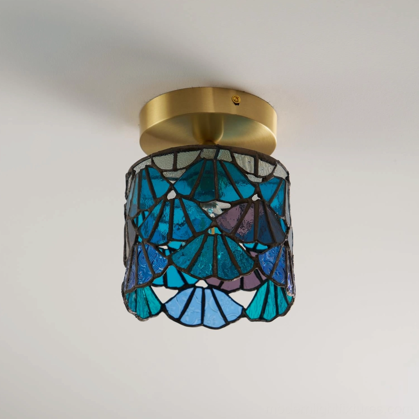 Tiffany style ceiling light blue shade front view showing classic lead-line design and brass hardware