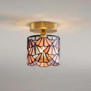Tiffany style semi-flush ceiling light with blue stained glass shade, detailed lead-line construction and brass finish