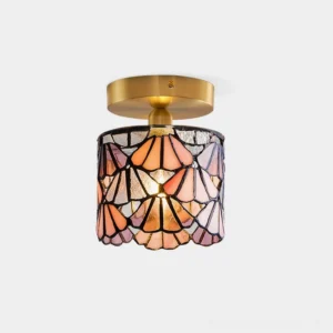 Tina Tiffany stained glass ceiling light with pink shade and brass canopy, front view showing lead-line pattern and scalloped rim