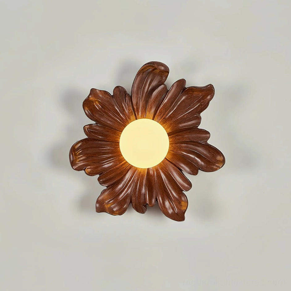 Tina walnut color flower wall sconce detail, rich resin botanical fixture in warm interior lighting