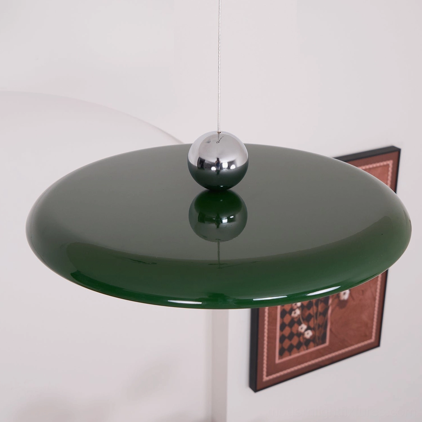 Full view of installed Tizio 50cm pendant lamp above dining table with warm lighting