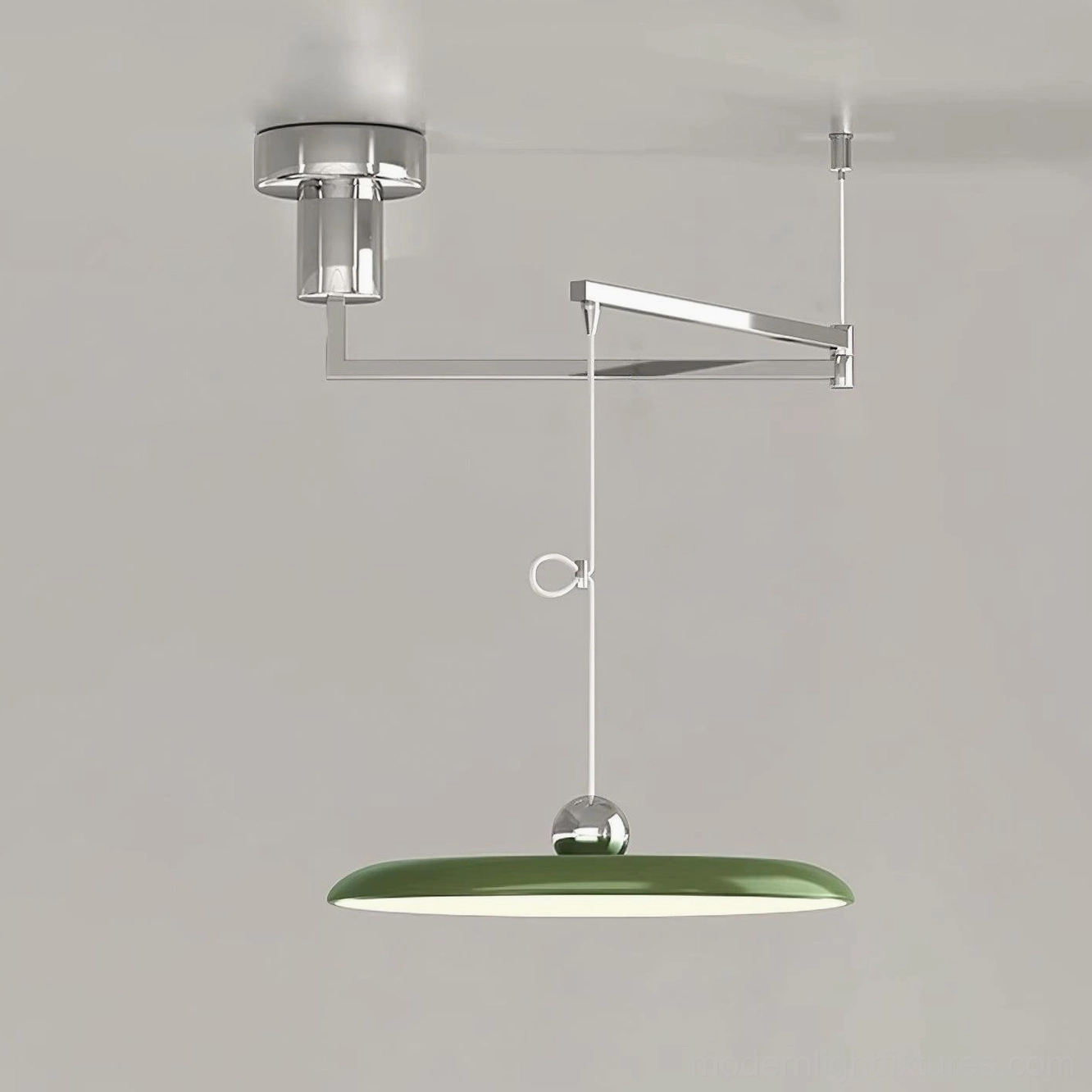 Chrome and green finished Tizio disc pendant lamp showing metallic frame and shade