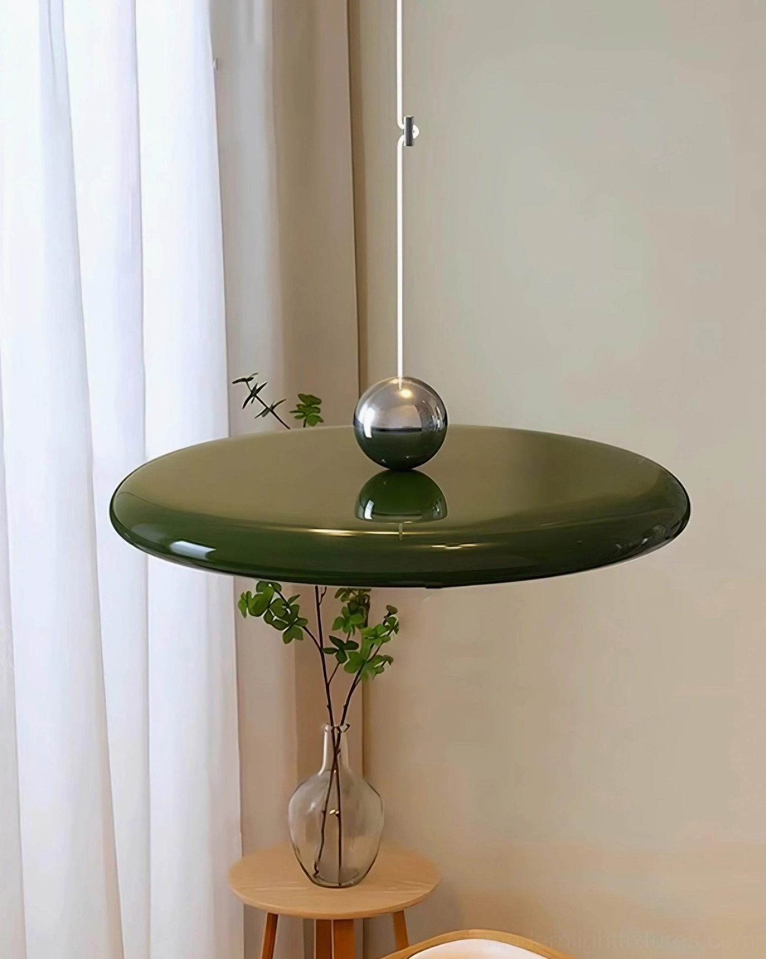 Modern pendant light mounted on sloped ceiling demonstrating compatibility with angled surfaces