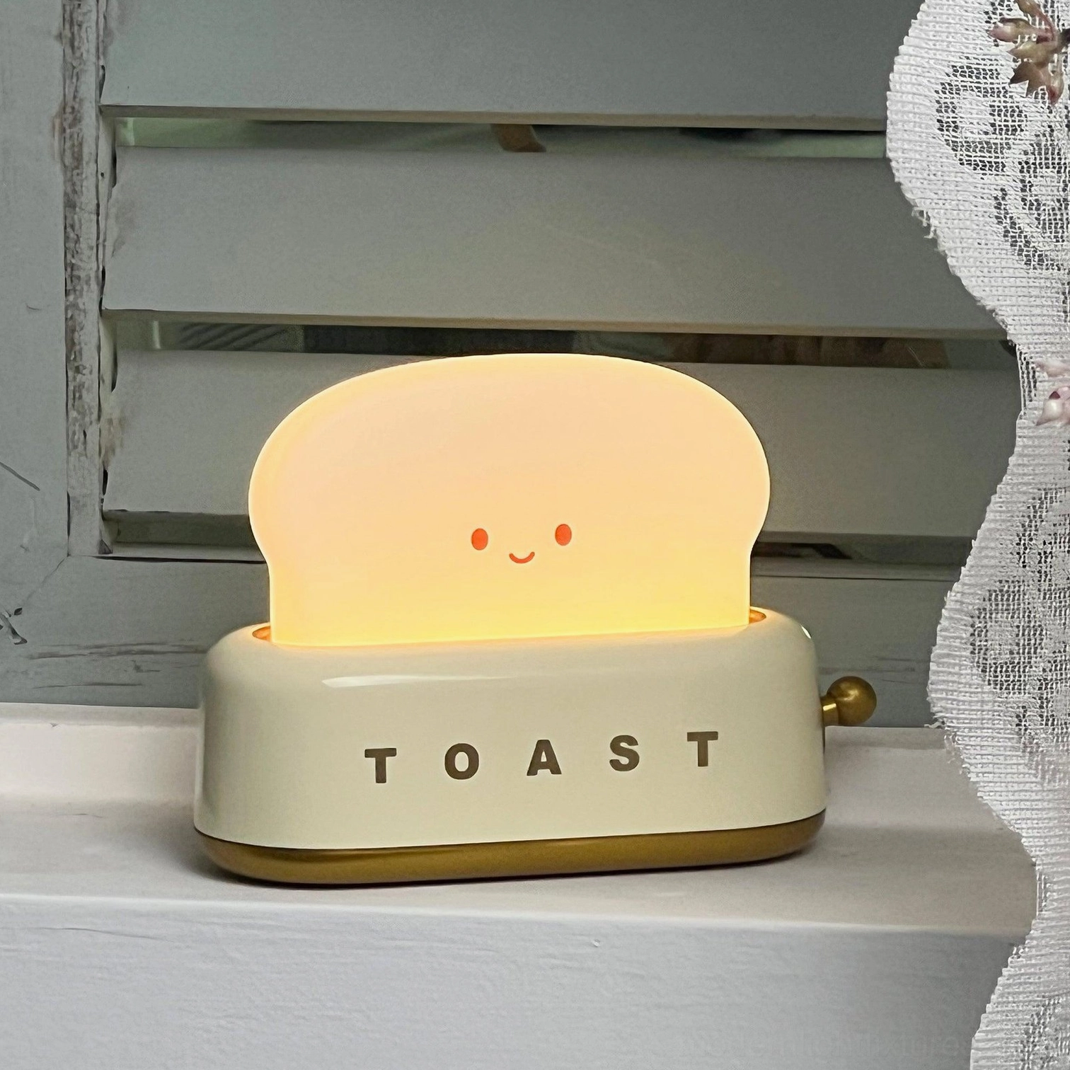 Toaster table lamp character piece adding unexpected charm to home office and bedroom spaces