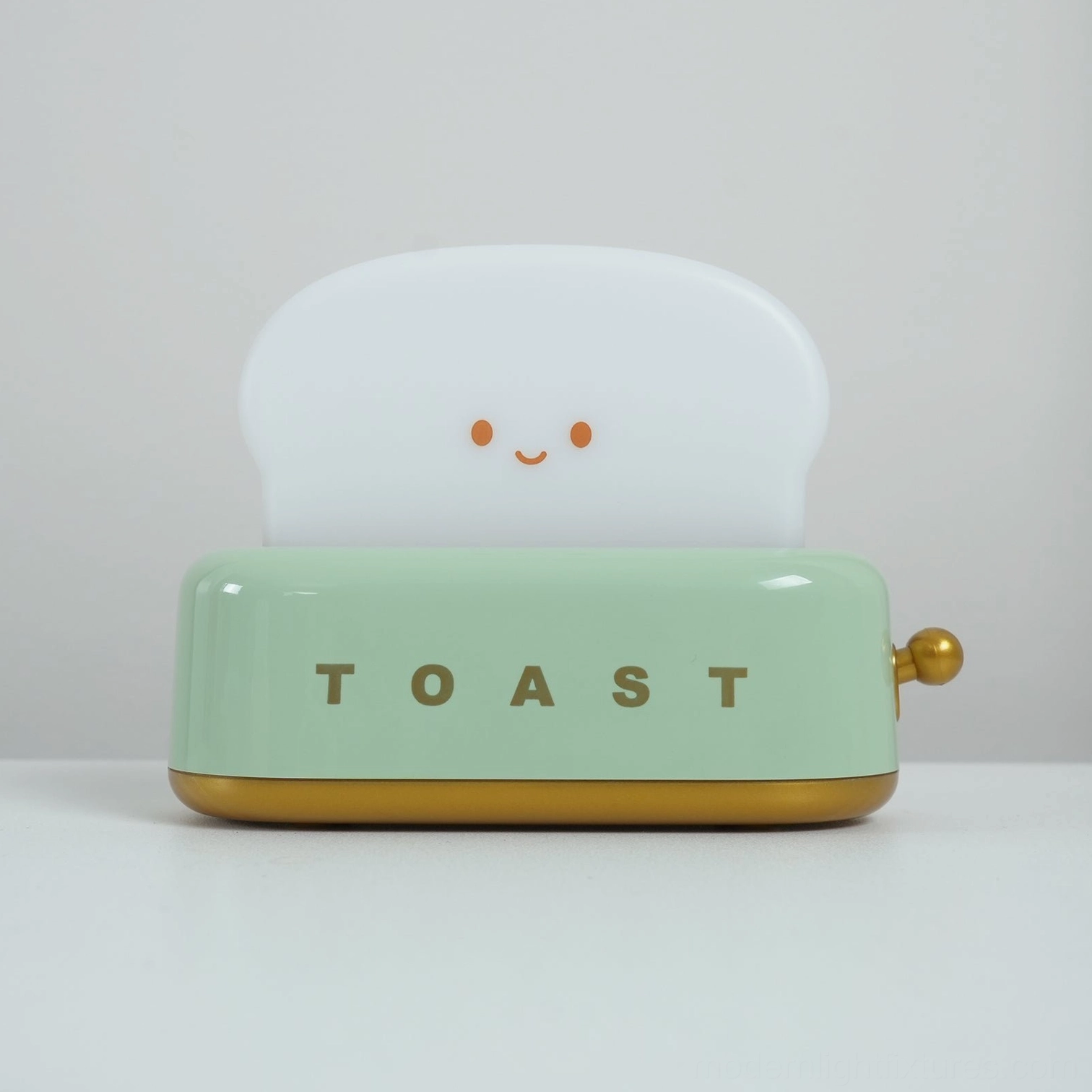 Compact toaster table lamp at 13.4cm diameter perfect for small spaces and tight shelving