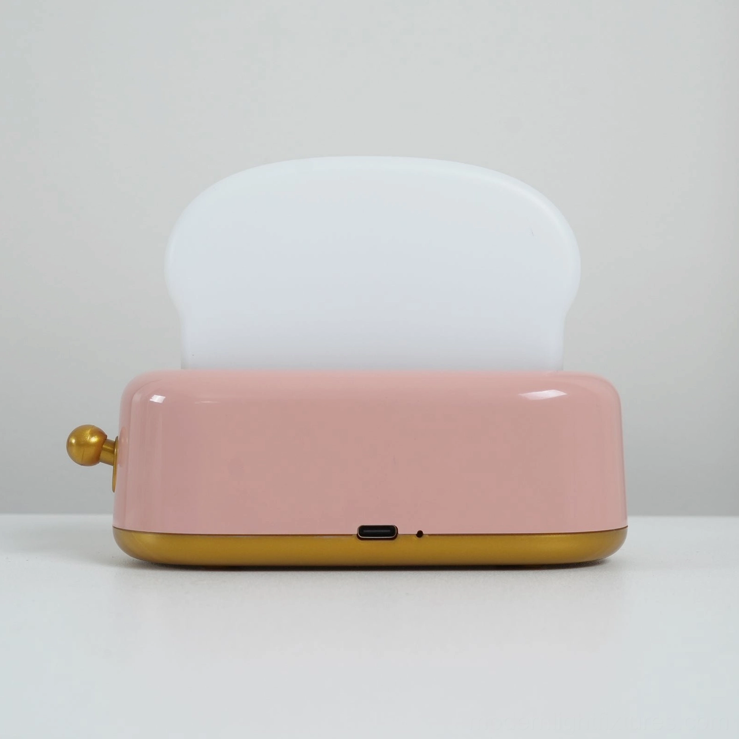 Toaster table lamp perfect for renters and travelers with lightweight portable design