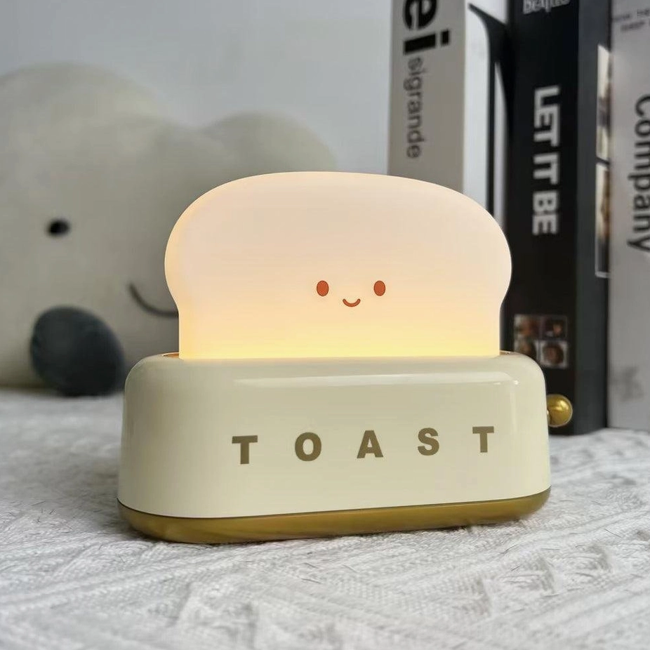Toaster table lamp showing retro kitsch aesthetic paired with practical modern USB charging