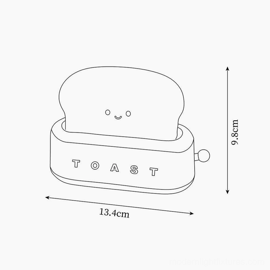 Toaster table lamp dimensional schematic with measurements 13.4cm diameter and 9.8cm height on white background