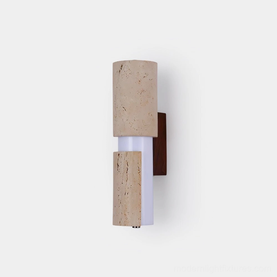 Tolira travertine wall sconce, compact 30cm height, front view showing asymmetric dual cylinders with beige stone and dark wood backplate in minimalist design