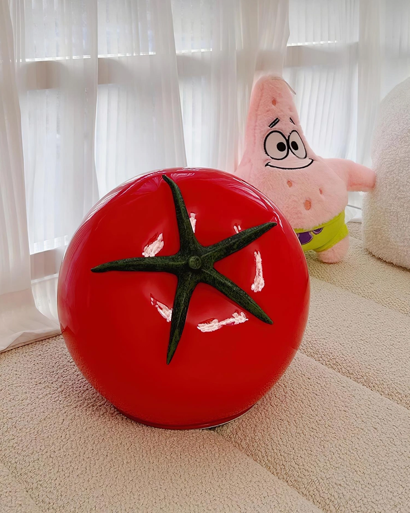 Modern tomato lamp with integrated LED creating ambient warm white lighting - table light