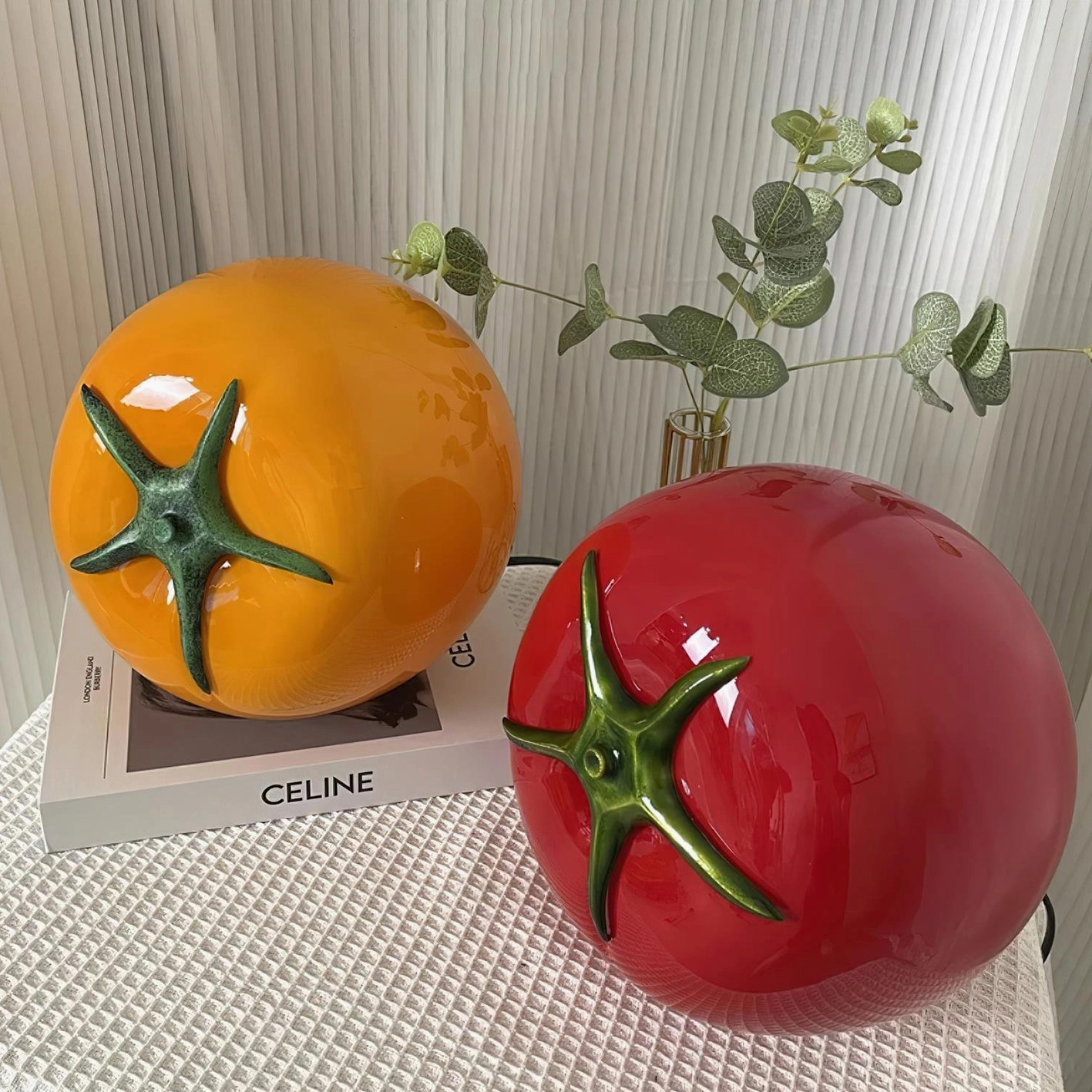Handcrafted tomato glass lamp showing green stem detail and base USB port feature