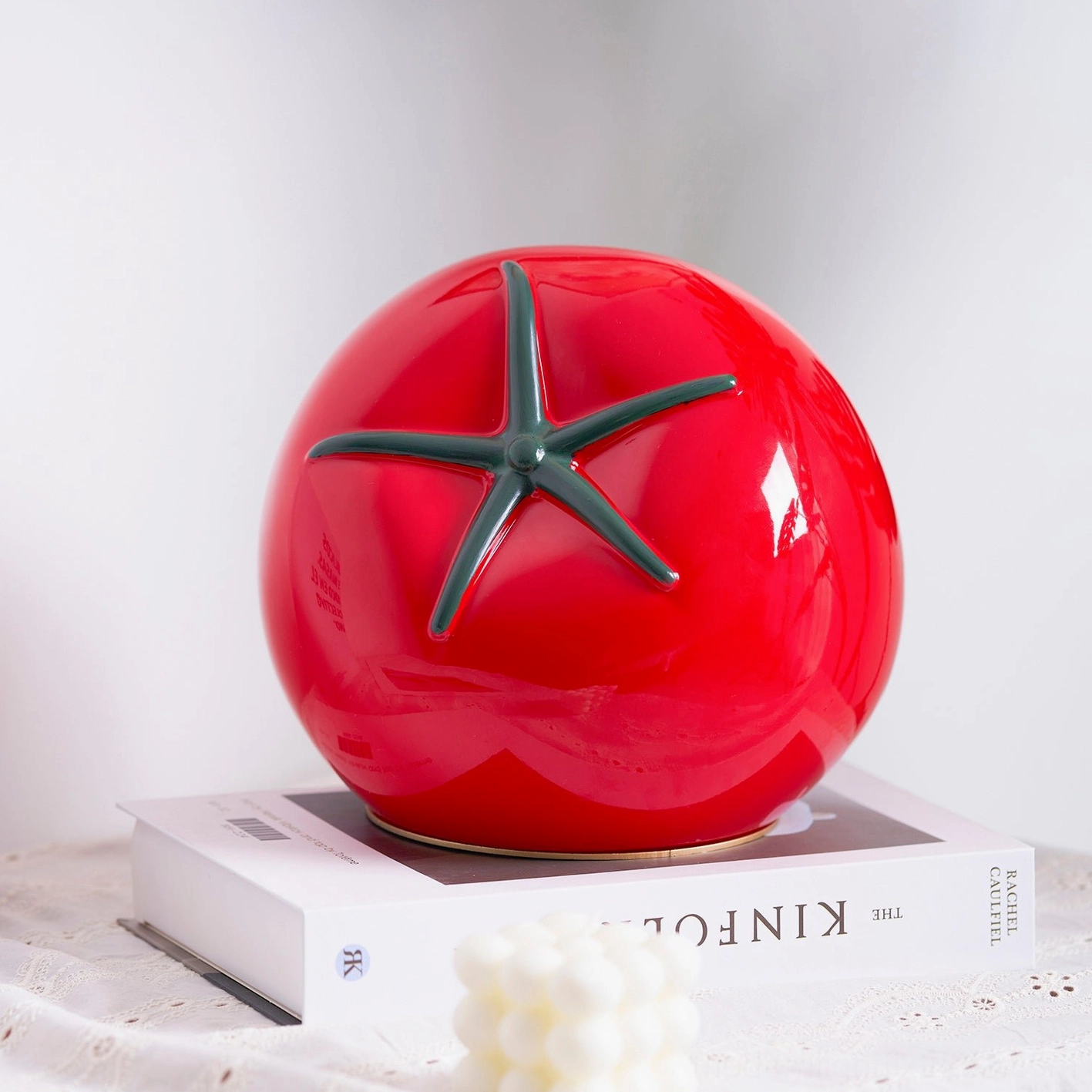 Tomato resin table lamp retail display product photography professional showcase