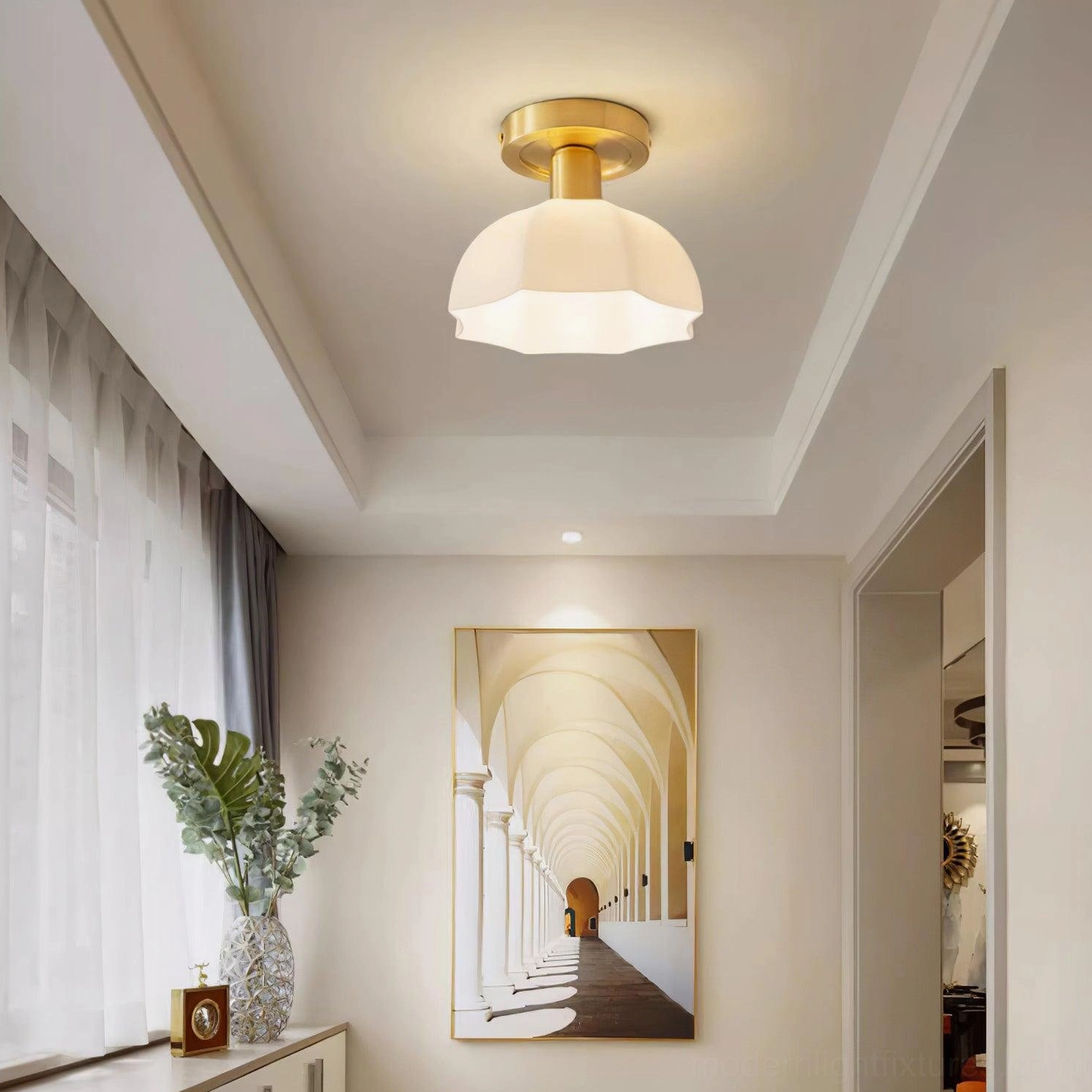 Top-down view of scalloped brass ceiling light showing canopy and wiring configuration
