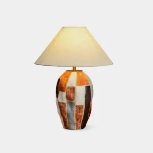 Torino ceramic table lamp with abstract color block geometric patchwork design on white studio background