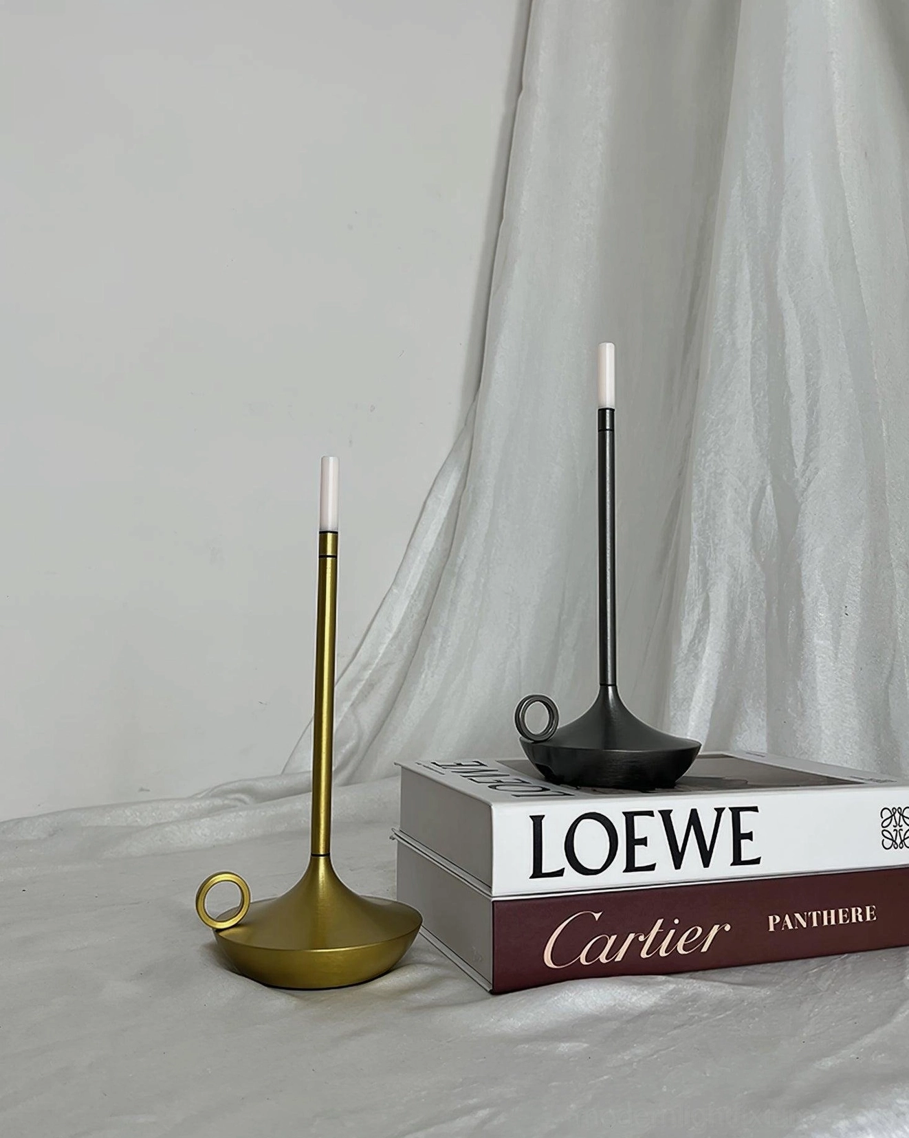 Modern touch activated LED candle table lamp showcasing intuitive control and elegant metal construction