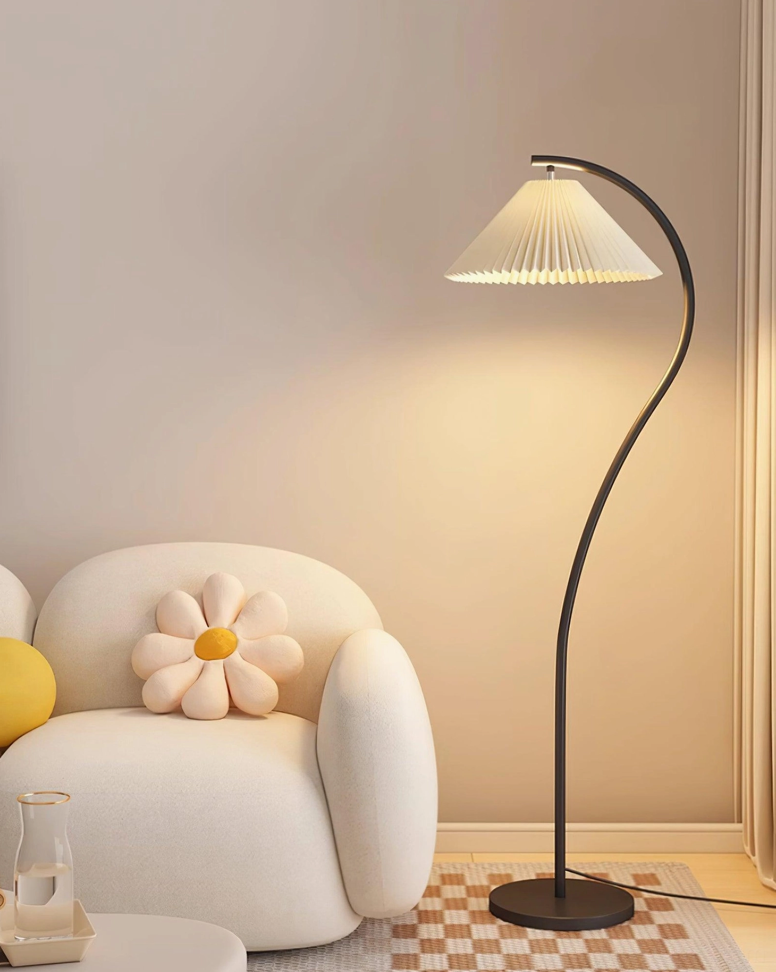 Black Tove curved pleated floor lamp in japandi living room corner with lounge seating