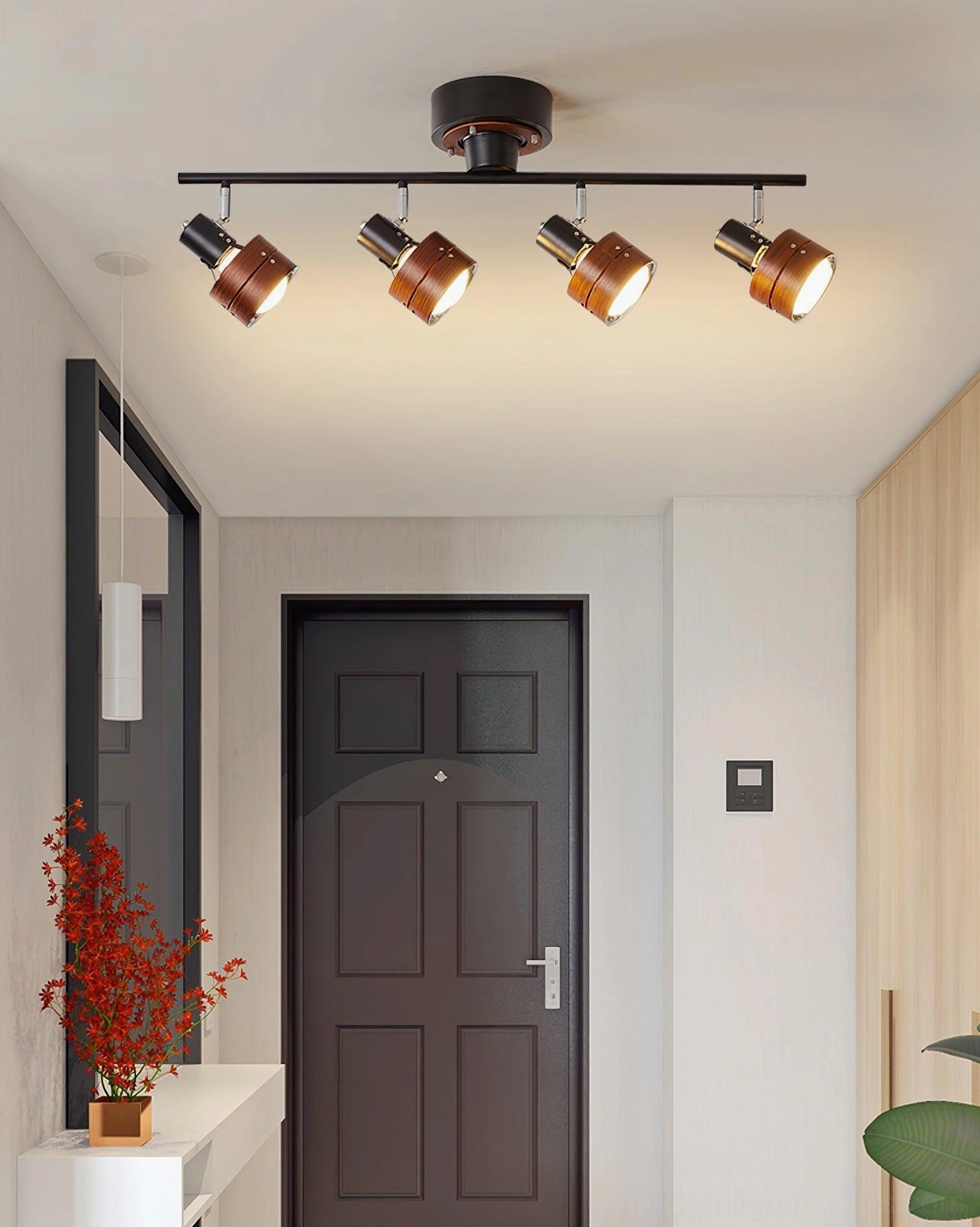 Four-head track ceiling fixture showing adjustable spotlight heads and wood construction details