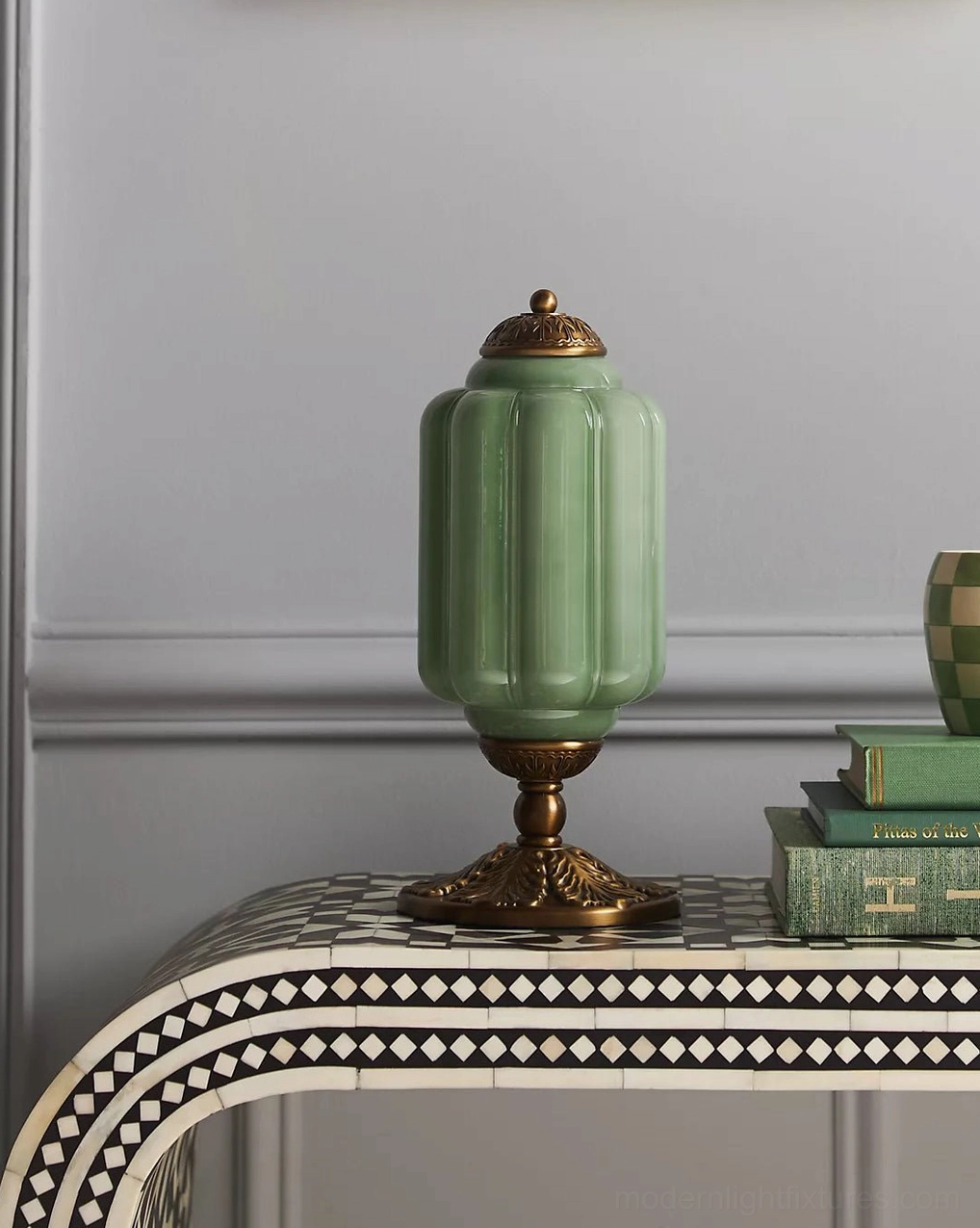 Traditional decorative table lamp with fluted glass body in jewel tone color palette