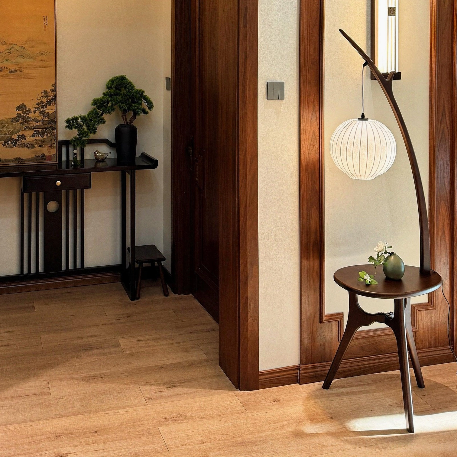 Artisanal wooden floor lamp with integrated table in traditional Chinese entryway with dark wood furniture