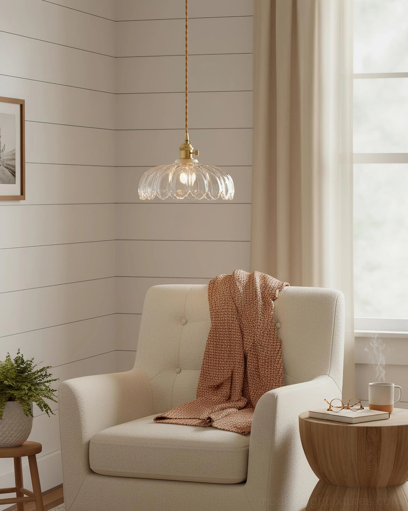 Clear fluted glass pendant lamp in cozy living room armchair corner