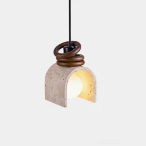 Travertine arched pendant light with warm glowing bulb, overhead top-down view showing porous stone shade and multi-layer wooden ring hardware against white background