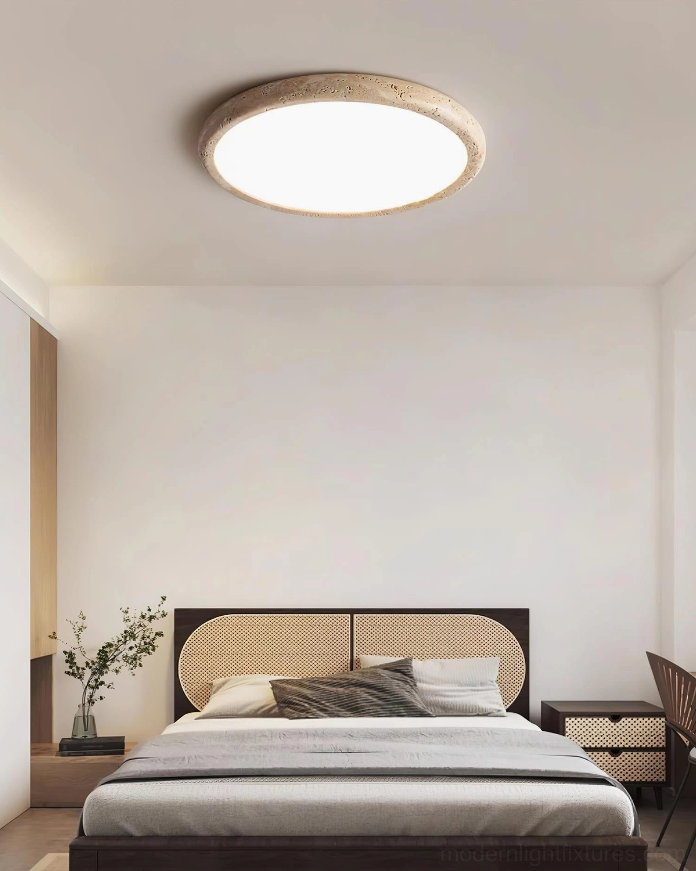 Travertine stone ceiling light in warm minimalist bedroom design