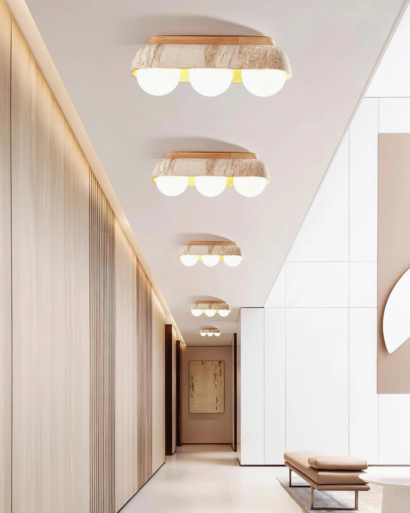 Architectural overhead shot of travertine ceiling light fixture installation in minimalist interior