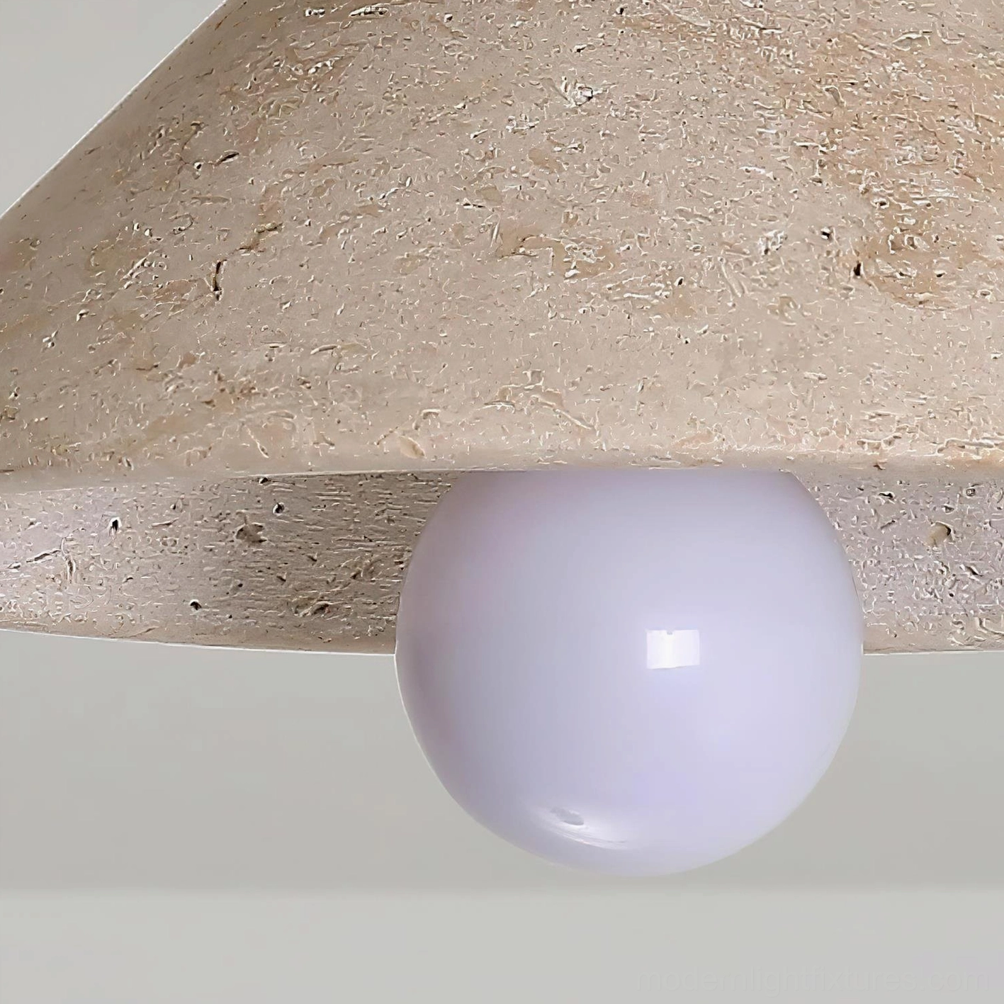 Sierra travertine semi-flush ceiling light in damp-rated bathroom with modern vanity mirror