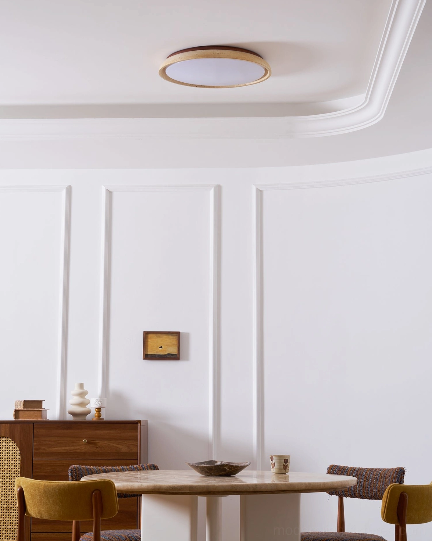 Natural travertine stone ceiling light with integrated LED showing even diffused illumination