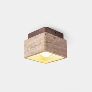 Modern travertine flush mount ceiling light with natural stone and wood base, front view on plain background