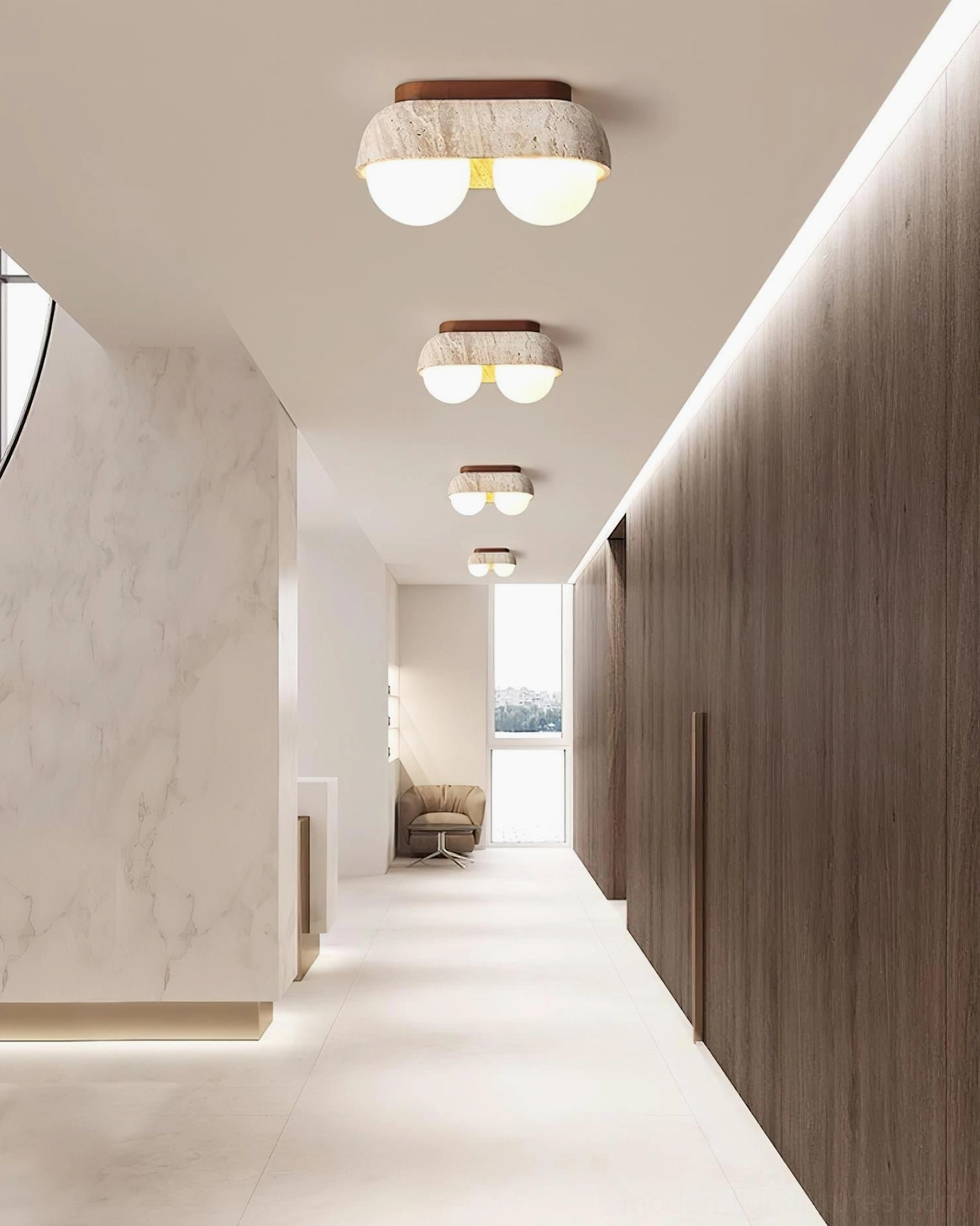 Multiple travertine ceiling light fixtures aligned in residential hallway creating warm ambient downlighting