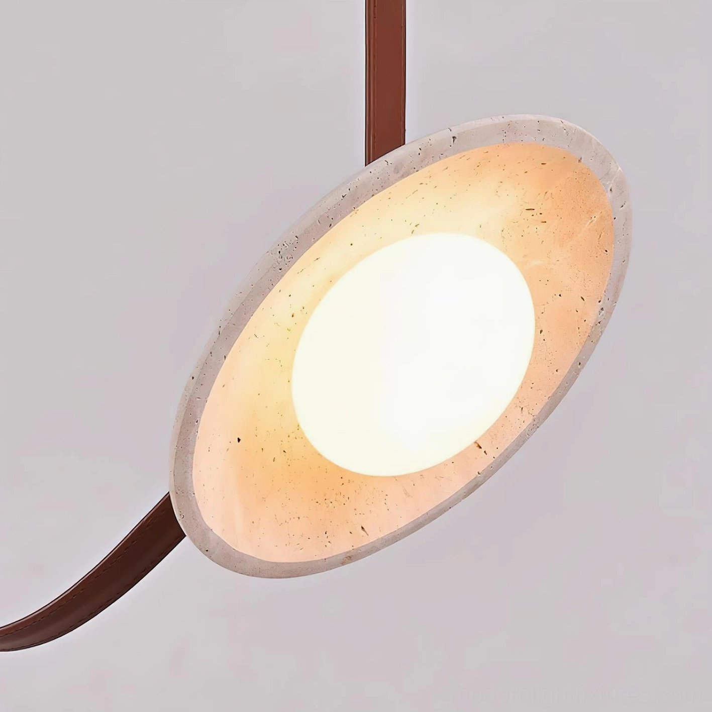 Modern travertine chandelier installation in contemporary interior, showing balanced proportions and warm light distribution