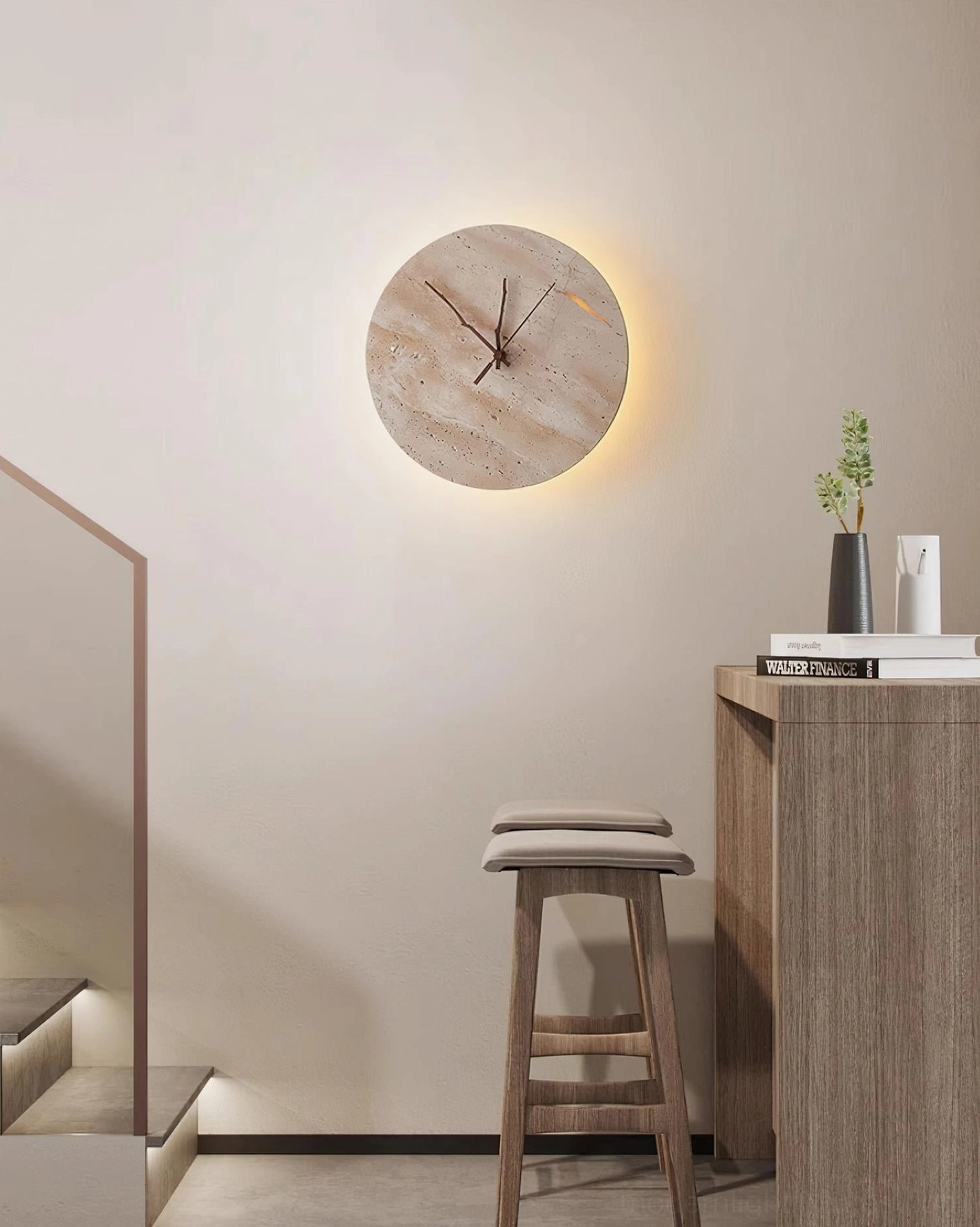 Travertine clock wall sconce installed in home entryway above wooden console table with warm lighting