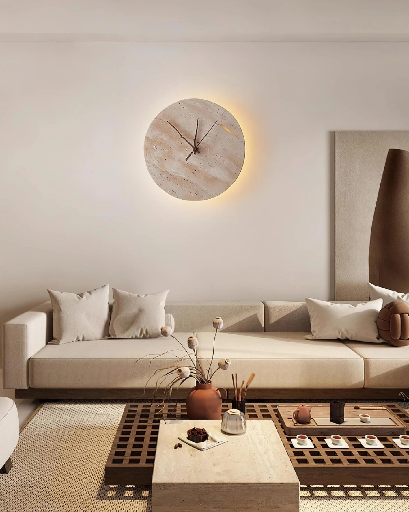 Modern living room with travertine clock wall lamp mounted above sectional sofa with minimalist decor