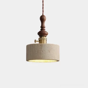 Cylindrical travertine stone pendant light with brass hardware and walnut wood stem, modern minimalist design