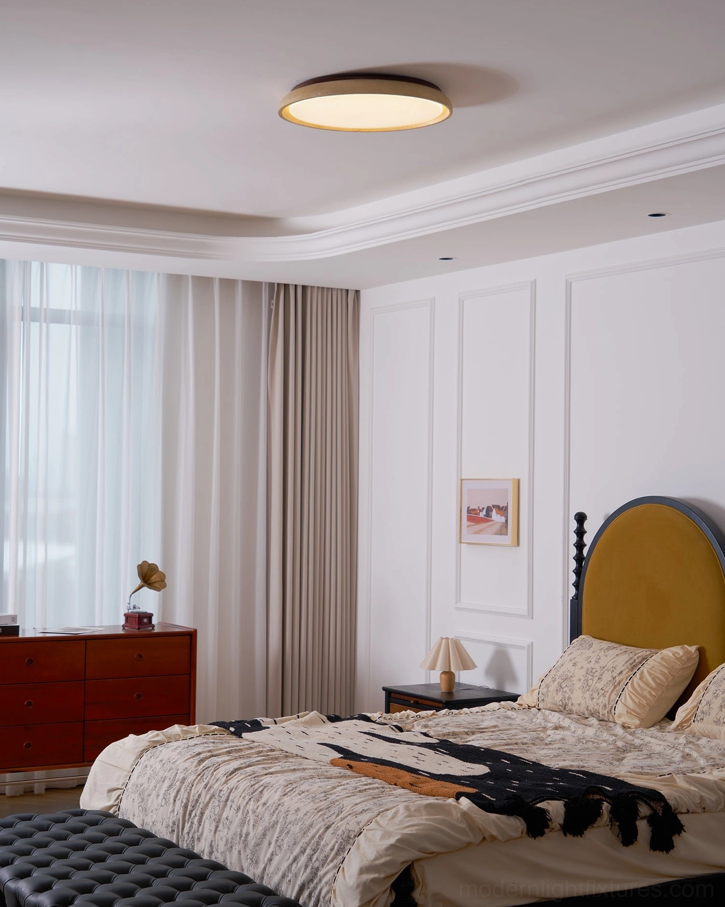 Travertine flush mount ceiling light creating warm ambient glow in modern interior space