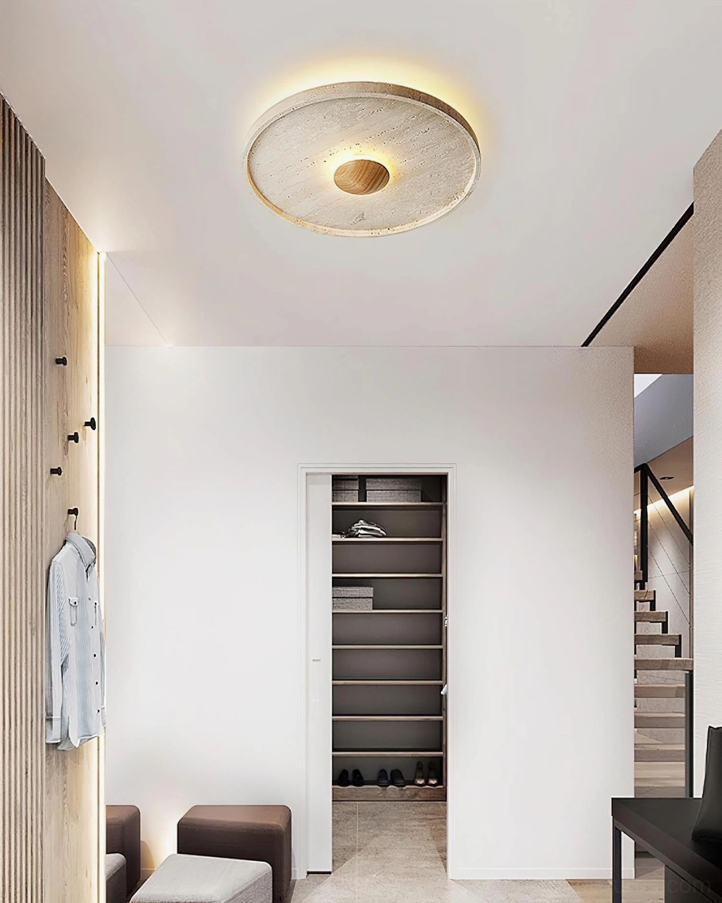 Single travertine ceiling light fixture in residential entryway with warm ambient lighting