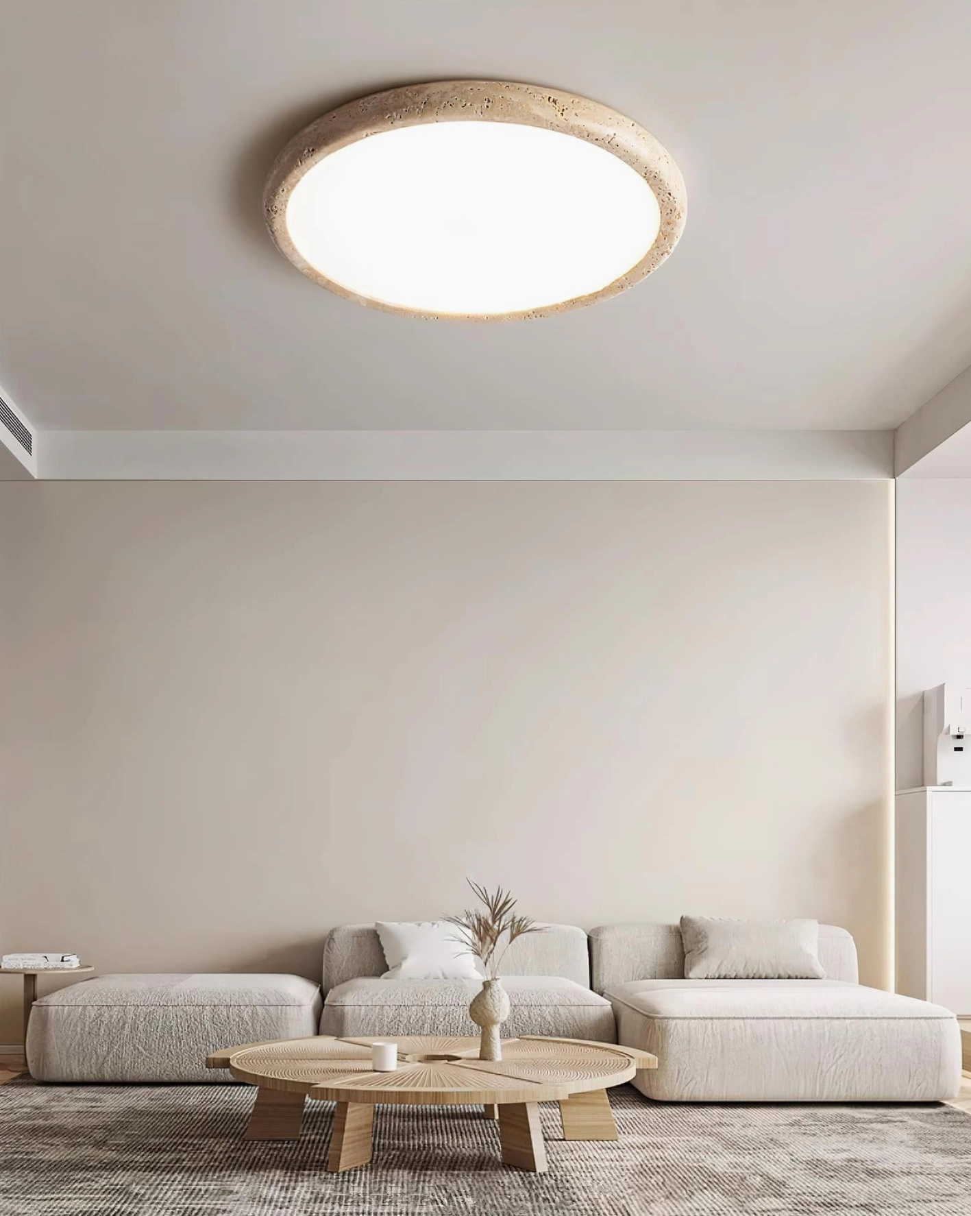 Kleine travertine ceiling light installed in modern minimalist living room