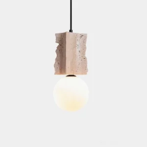 Travertine globe pendant light with irregular stone base and frosted glass sphere, overhead studio view showing sculptural design details