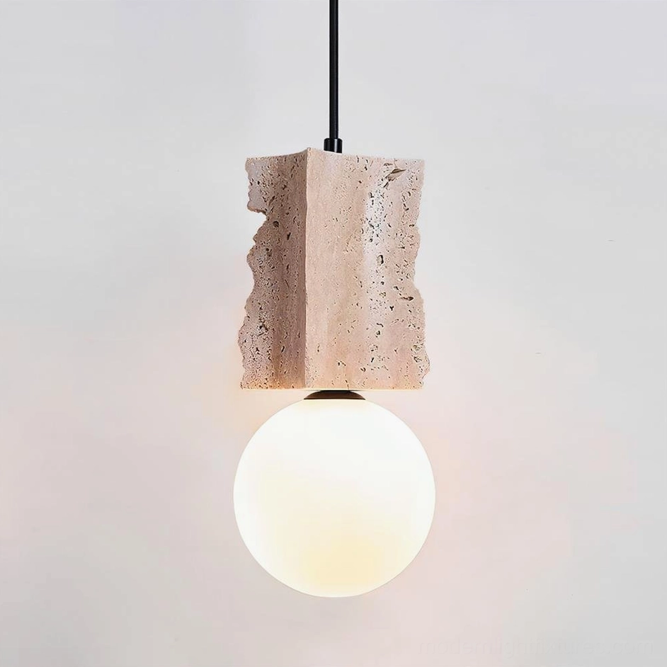 Travertine pendant lamp three-quarter angle showcasing organic stone texture and natural surface irregularities characteristic of authentic travertine