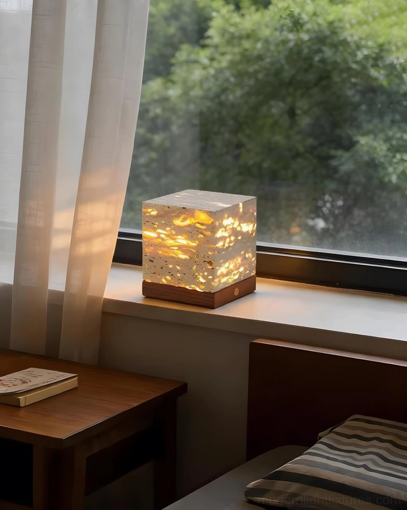 Travertine table lamp front view bedroom windowsill warm light natural setting