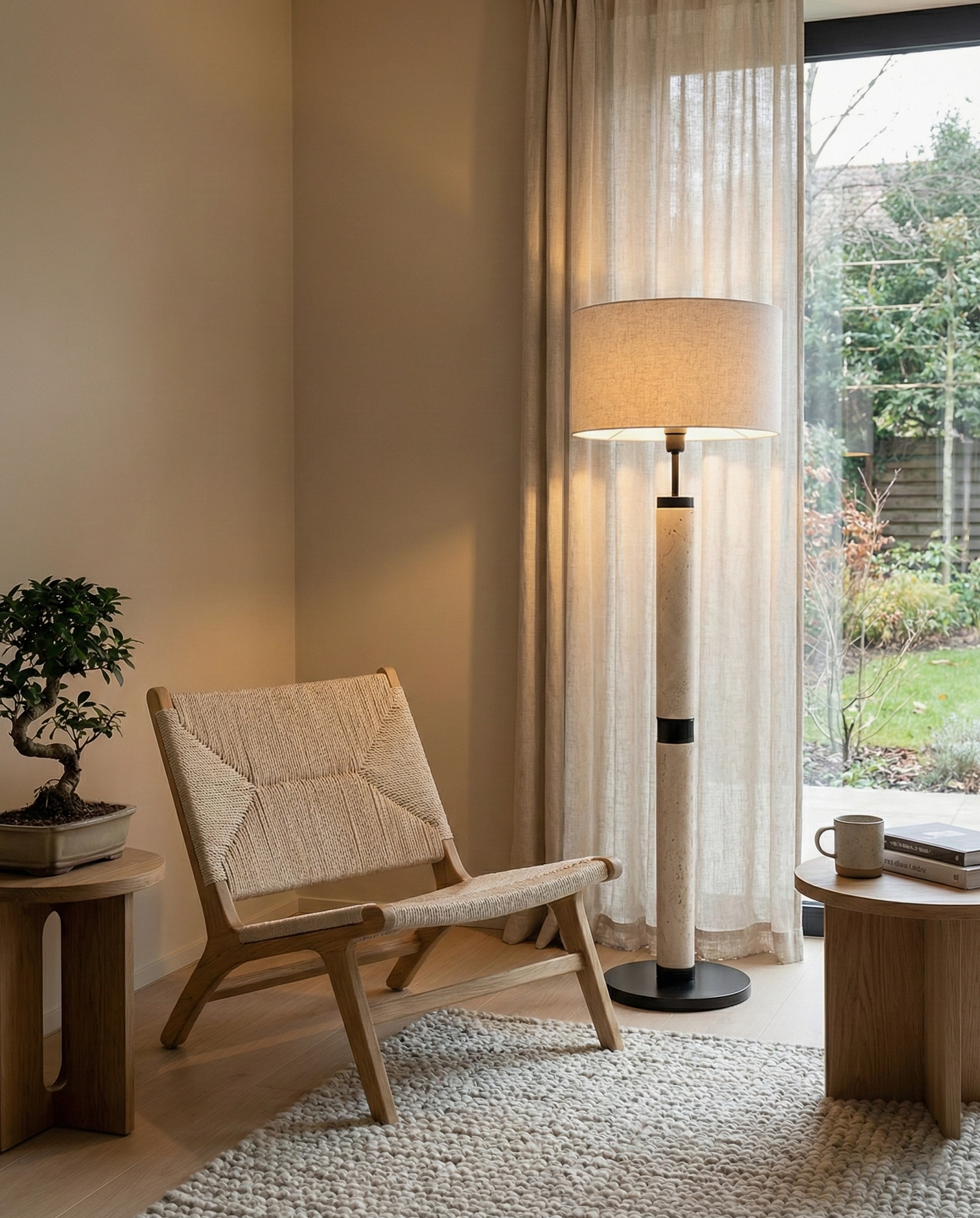 Reading corner floor lamp in cozy living room - travertine stone lamp with natural window light